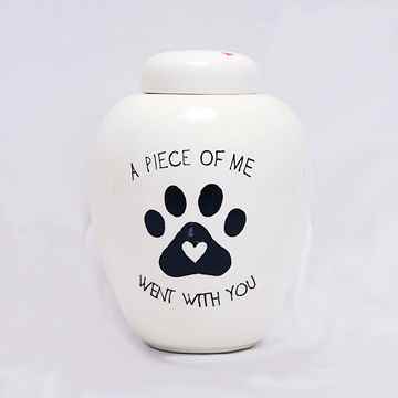 Picture of CREMATION URN CERAMIC WHITE "A piece of me went with you" with PAW PRINT and HEART- Small