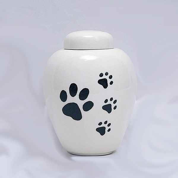 Picture of CREMATION URN CERAMIC WHITE with BIG PAW and 3 SMALL PAWS-Small