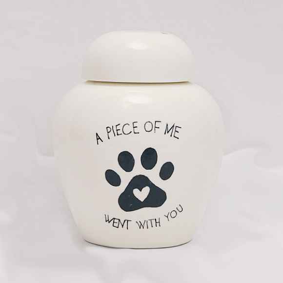 Picture of CREMATION URN CERAMIC WHITE "A piece of me went with you" with PAW PRINT and HEART- Medium